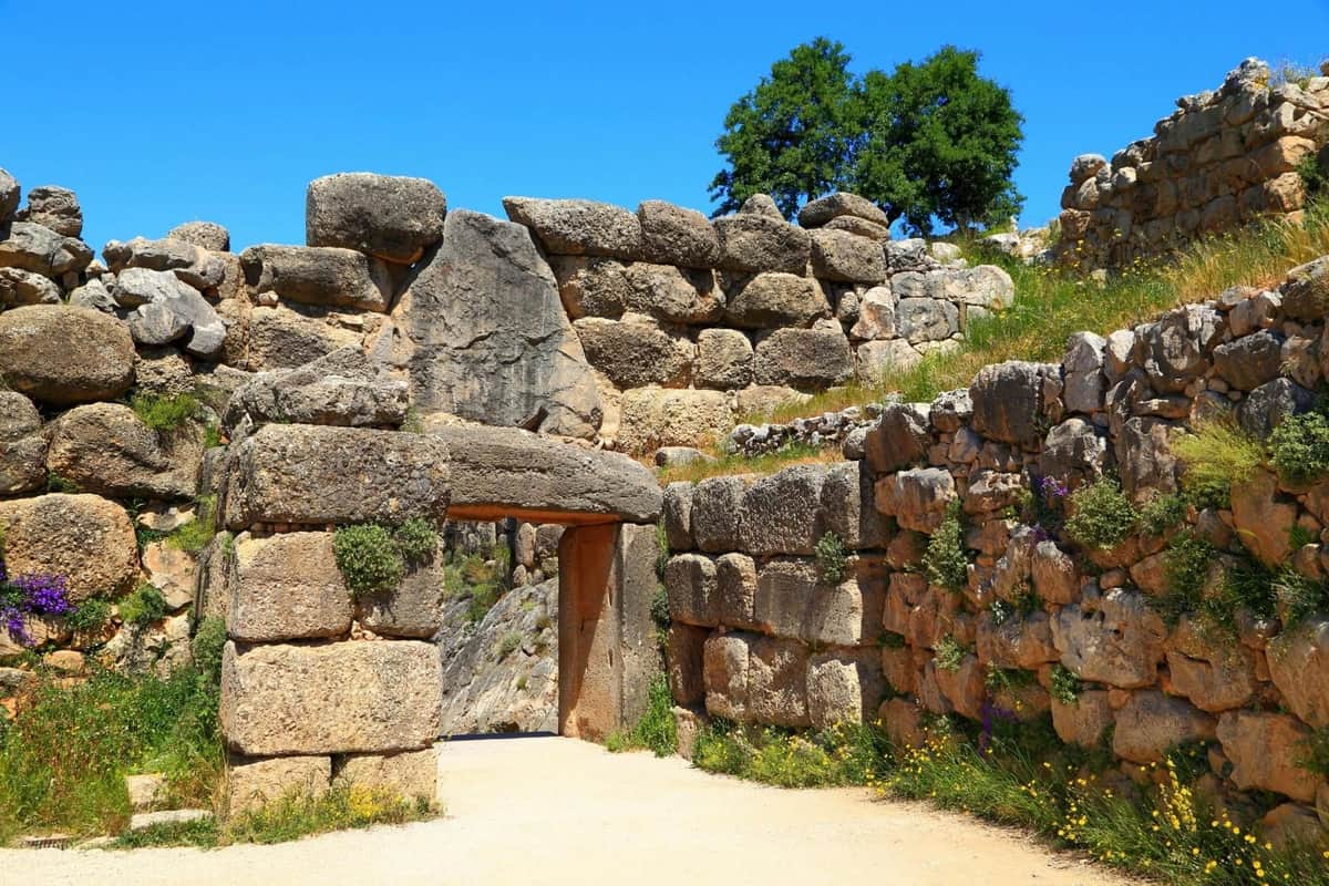 Mycenae, Epidaurus & Nafplio: Full Day Tour from Athens The famous Lion Gate of Mycenae, an ancient stone entrance framed by massive Cyclopean walls.